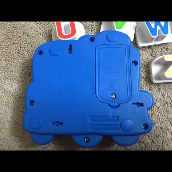 Melissa and Doug Peg Puzzle & Leapfrog Phonics Toy - Picture 7 of 12